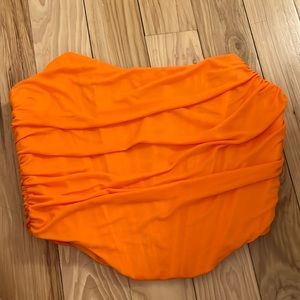 Orange strapless crop top with zip up back